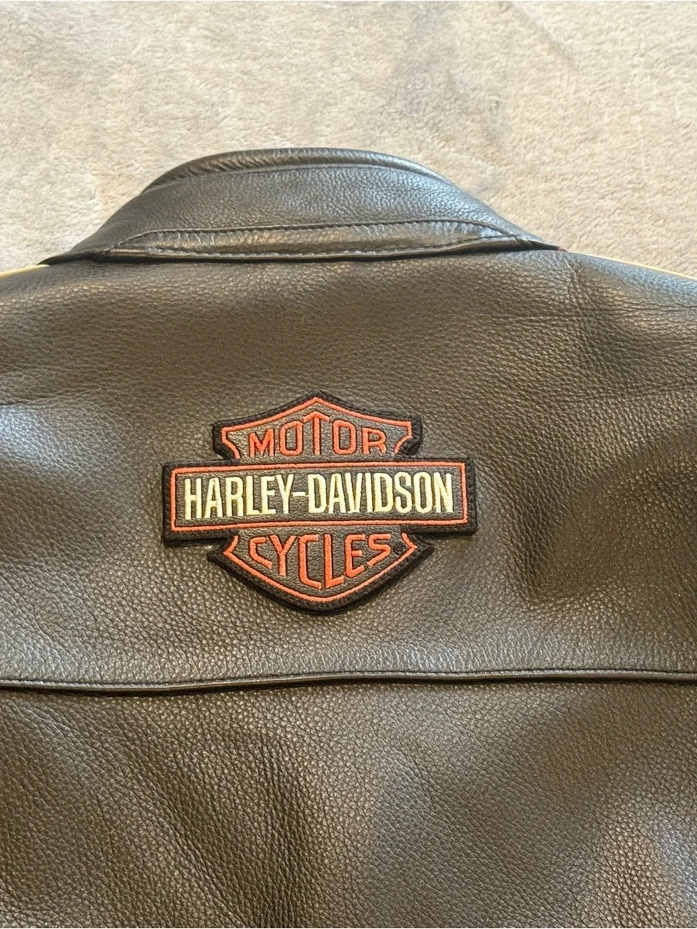 Harley-Davidson Black Leather Jacket with Orange and Cream Racing Stripes